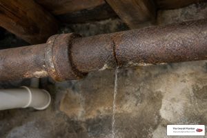 corroded cast iron pipe with hairline leak