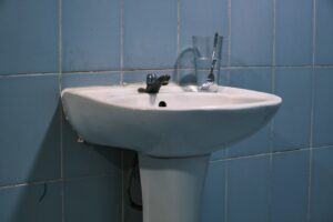slow drain fix bathroom sink pooling water