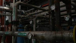 pressure testing manifold with bleed valves and calibrated test gauge