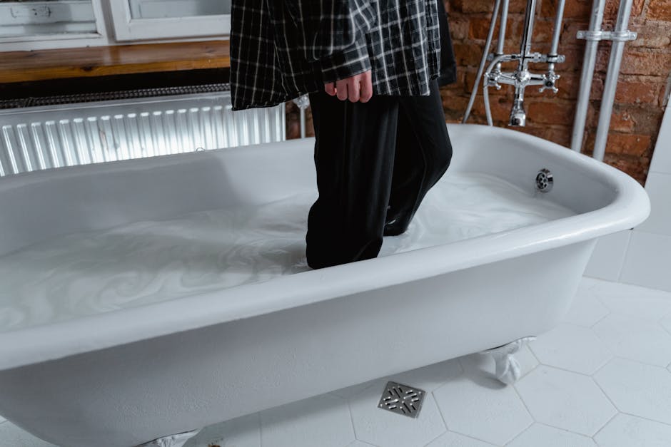 water backing up in a bathroom sink indicating a clog - drain cleaning service houston water backing up in a bathroom sink indicating a clog - drain cleaning service houston